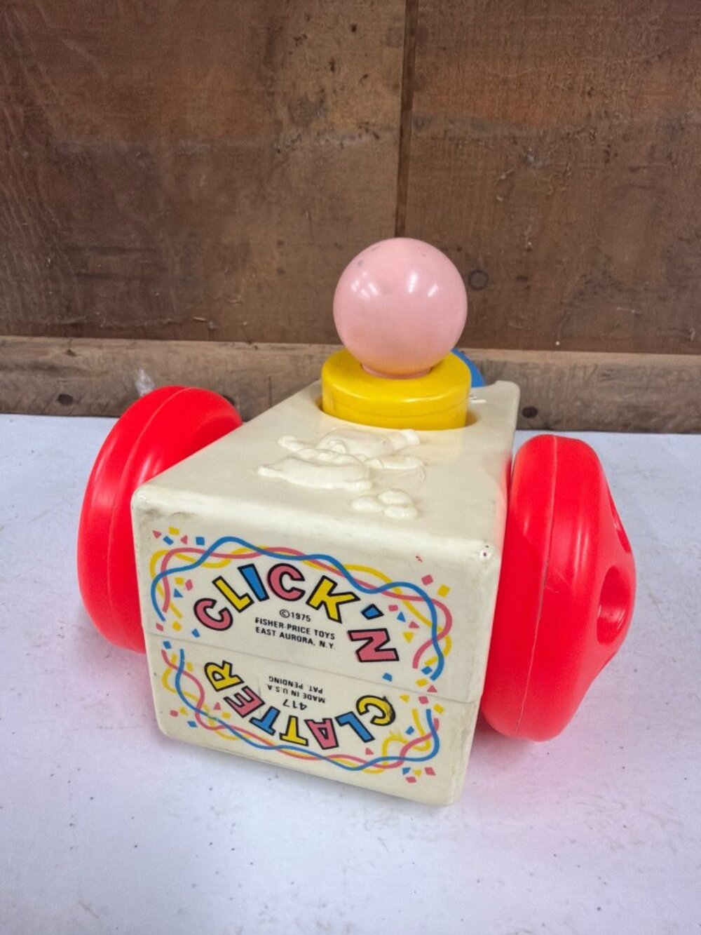 Vintage Fisher-Price 1975 Click N Clatter Push Toy With Red Wheels & Yellow Base - Picture 3 of 8